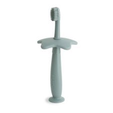 Brosse à dents d'apprentissage en silicone vert - Mushie  Produits