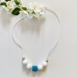 Collier d'eveil et de portage Sweet candy Lagoon Produits